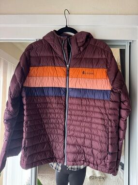 cotopaxi Burgundy Quilted Hooded Jacket with Orange, Peach & Navy Stripes